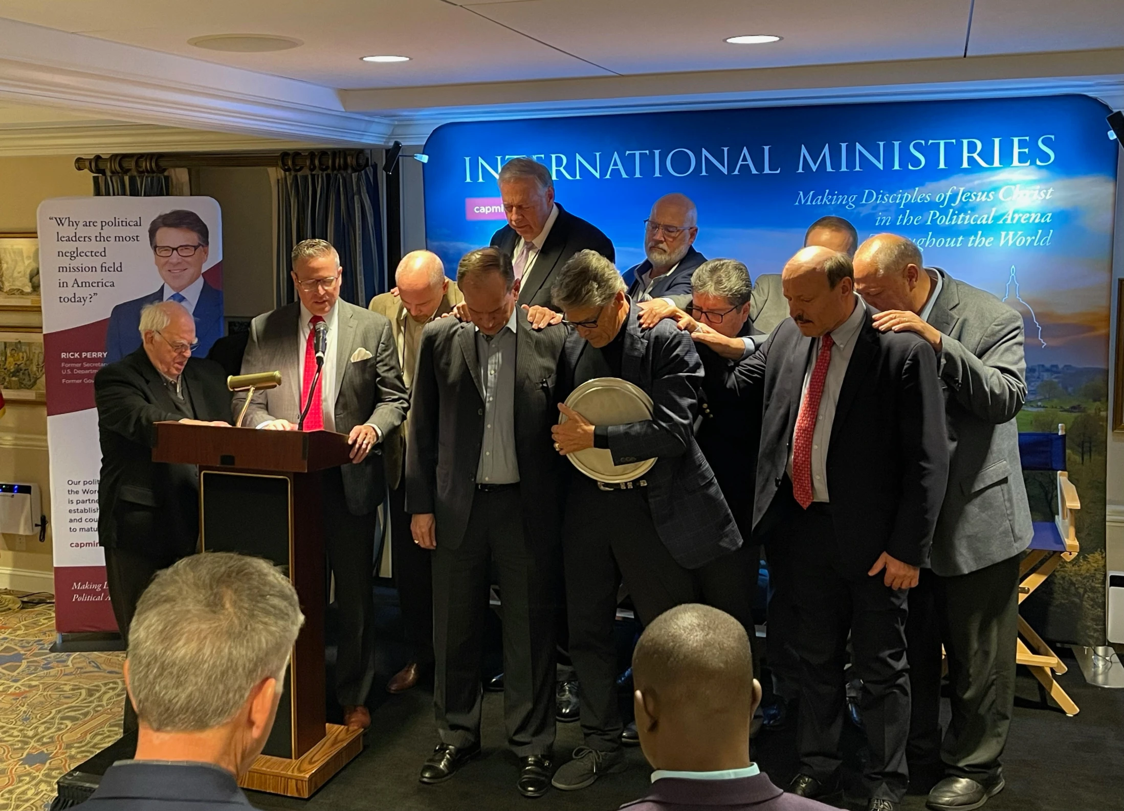 Praying over Rick Perry and Alex Acosta